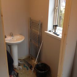 Handbasin & radiator plumbed in